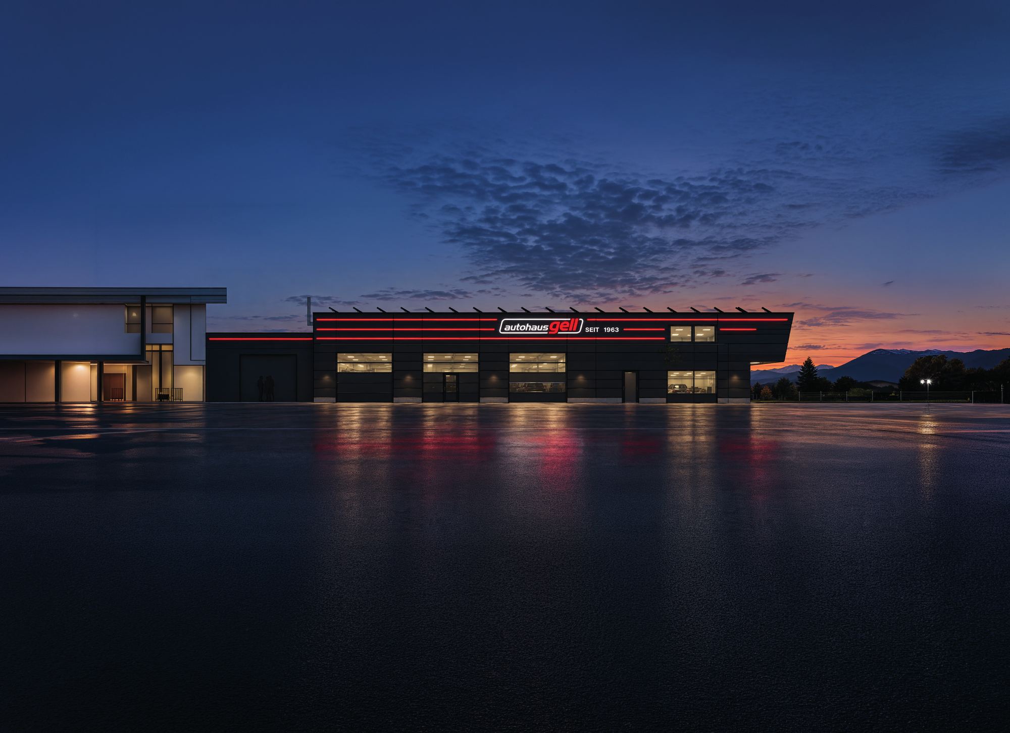 Das neue Werkstattgebäude von autohaus gell in der Abenddämmerung